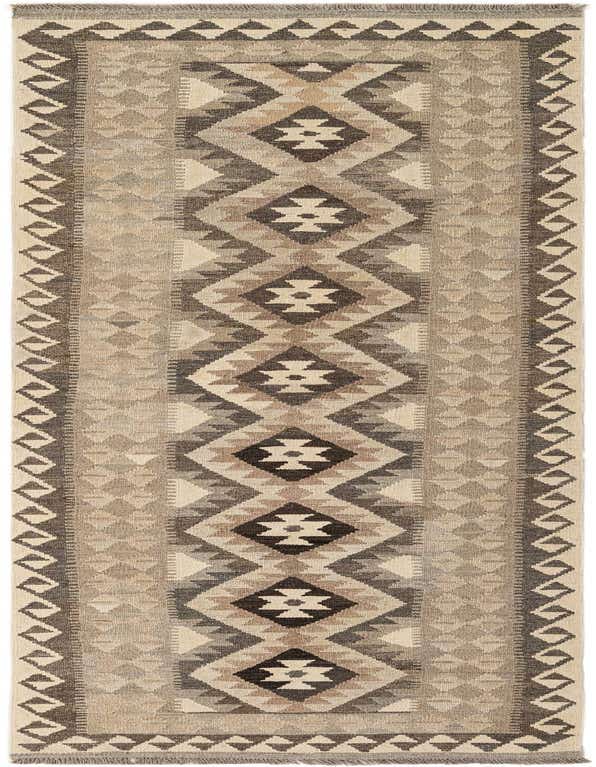 A 9 ft runner rug featuring a tribal geometric pattern in shades of ivory, cream, and brown, ideal for a hallway.