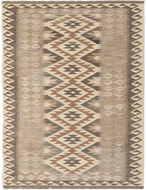 A 9 ft runner rug featuring a tribal geometric pattern in shades of ivory, cream, brown, and grey, ideal for a hallway.