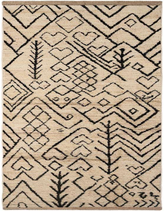 A 12 ft runner rug in ivory and black with a tribal, modern pattern featuring geometric shapes and lines.