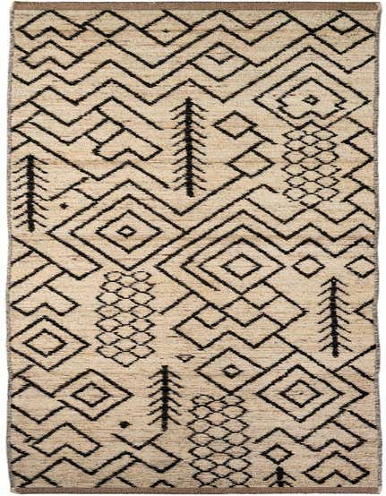 A 16 ft runner rug in ivory with a black tribal geometric pattern, perfect for a hallway.