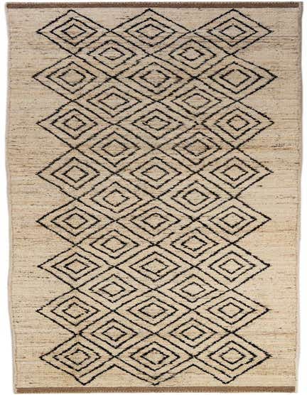 A 16 ft ivory runner rug with a repeating black tribal diamond pattern, ideal for a hallway.