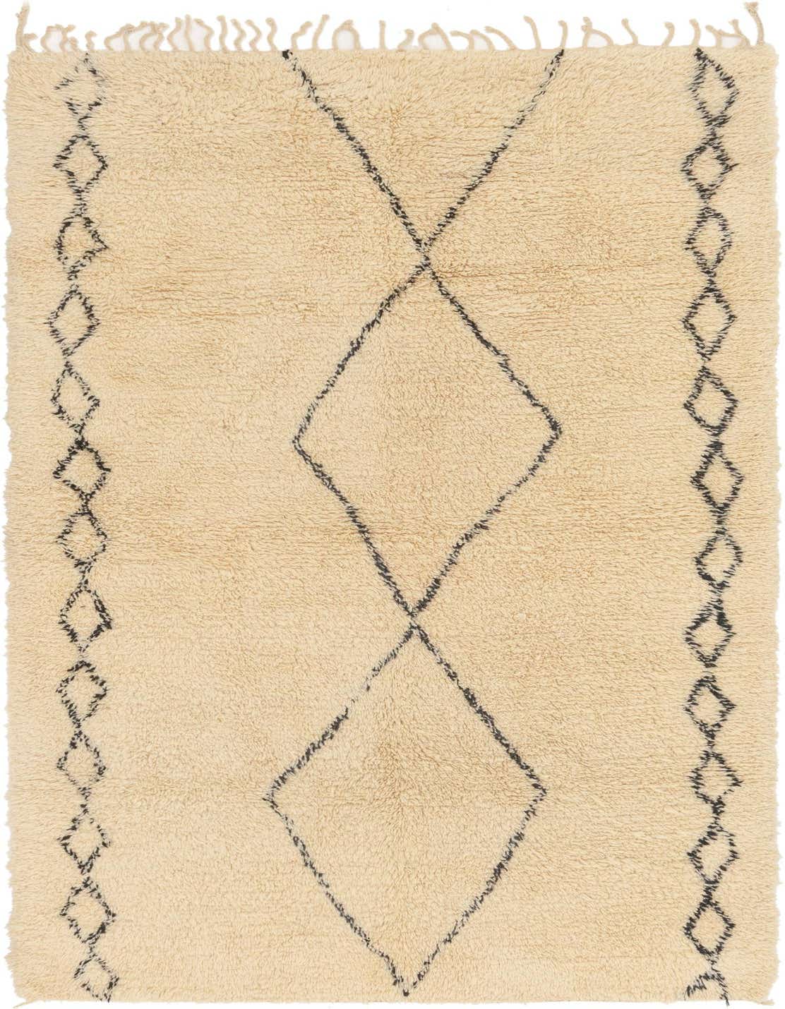 A 12 ft runner rug in ivory wool shag with black tribal diamond patterns, perfect for a hallway.