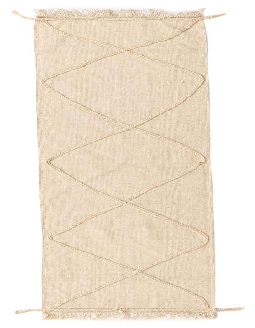 An 8 ft runner rug in ivory wool, featuring a modern tribal diamond pattern with braided accents and fringe.
