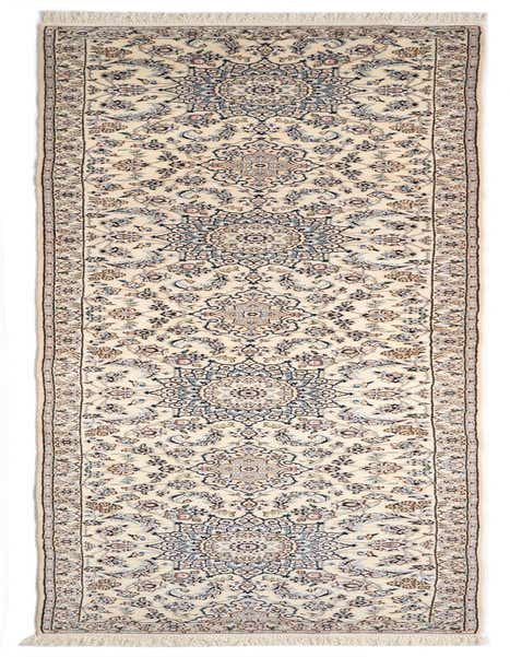 A 14 ft runner rug with an ivory background and intricate blue, cream, and brown Persian floral patterns, suitable for a hallway.