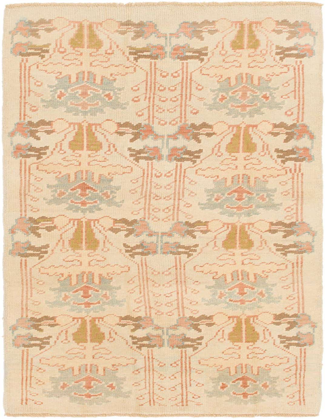 An 8 ft runner rug from the Oushak collection, featuring an ivory background with tribal and abstract patterns in muted tones of cream, peach, blue, and brown.