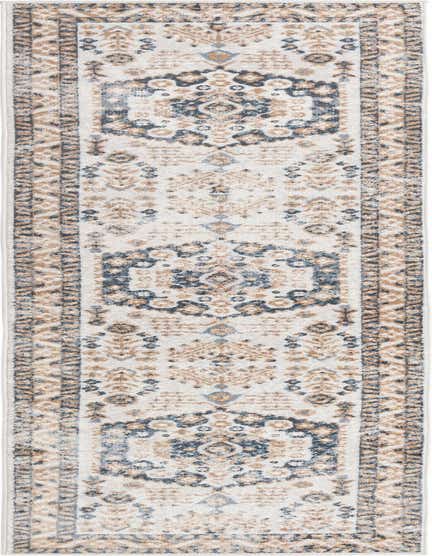 A 12 ft runner rug in ivory with a distressed Bohemian medallion pattern in shades of blue and tan, perfect for a hallway.