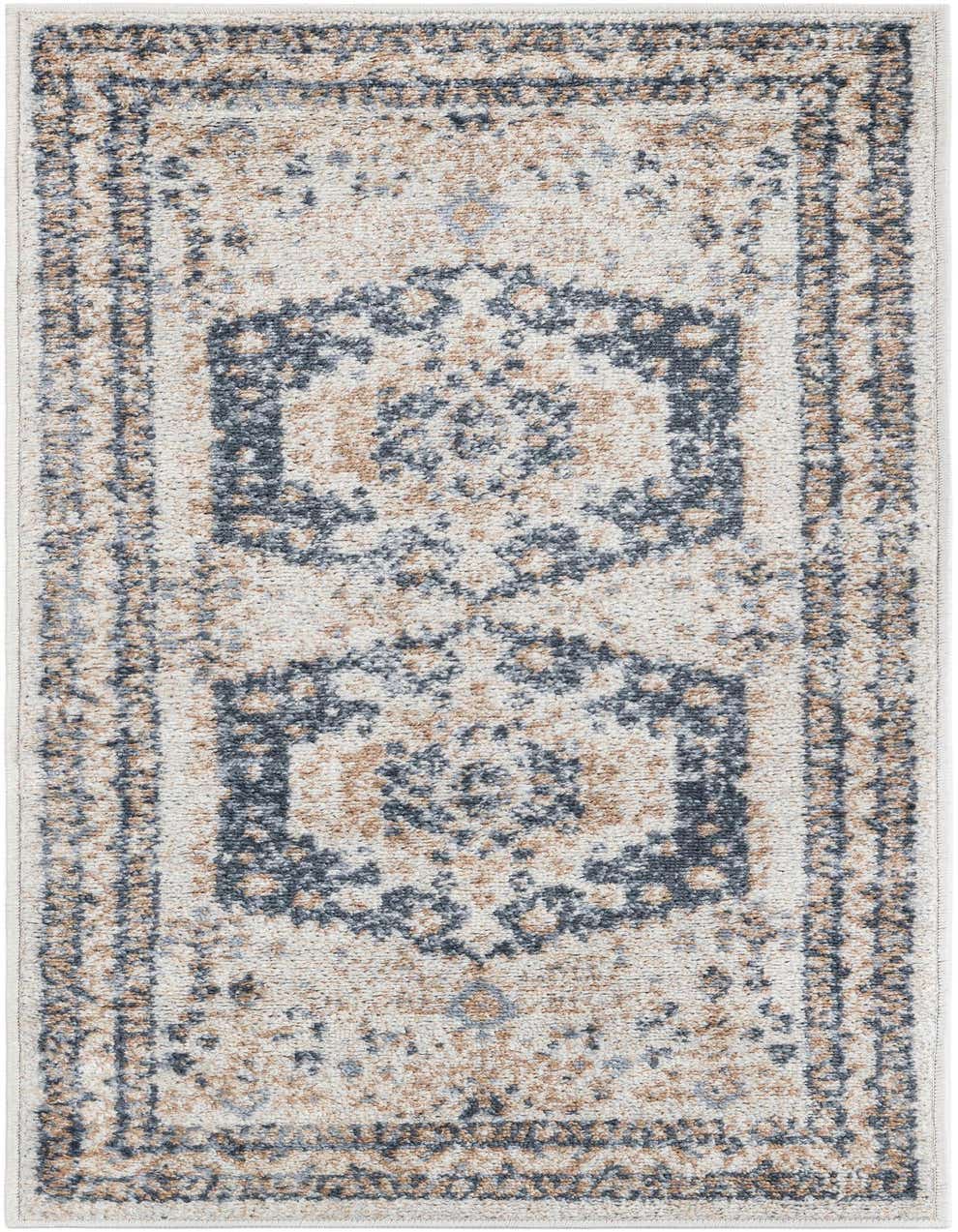 A 4 ft runner rug in ivory and cream with a distressed traditional medallion pattern in blue and brown.