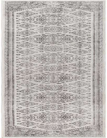 A 14 ft ivory runner rug with a distressed traditional medallion pattern and a border, ideal for a hallway.