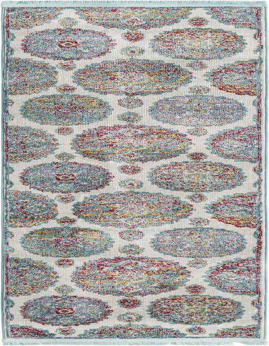 An 8 ft runner rug with a cream background and a pattern of large and small bohemian floral medallions in teal, red, and yellow.