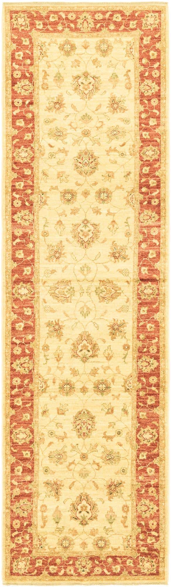 A 10 ft ivory runner rug with a traditional botanical and floral pattern, featuring a rust-red border.