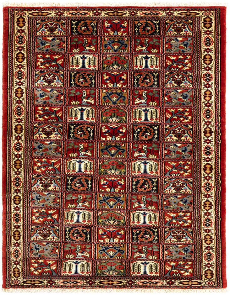 A 7 ft runner rug in a Persian style, featuring a grid of intricate floral and animal motifs in ivories, creams, and reds.