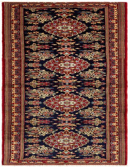A 13 ft runner rug from the Rugs.com Qom collection, featuring a traditional Persian floral pattern in ivories and creams on a dark blue background with a red border.