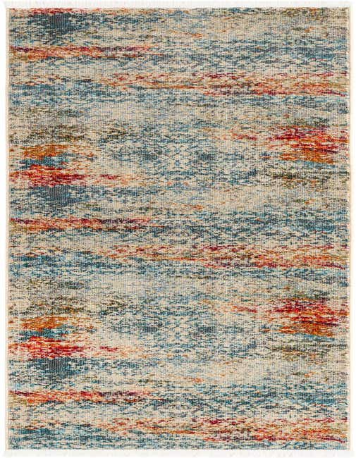An 8 ft runner rug from the Santiago collection featuring an eclectic, modern abstract pattern in ivories, creams, blues, and hints of red and orange.