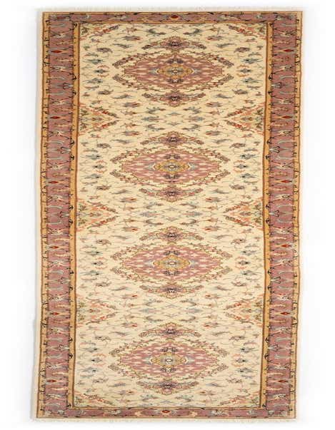 A 13 ft ivory runner rug with a traditional Persian pattern, featuring intricate floral medallions and a dusty rose border, perfect for a hallway.