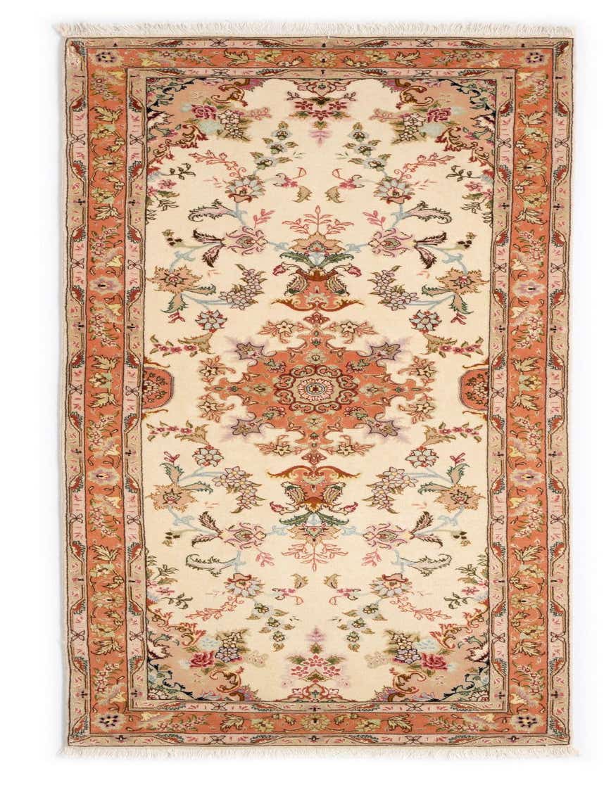 A 7 ft Tabriz Persian runner rug in ivory and cream with an intricate floral pattern and peach border.
