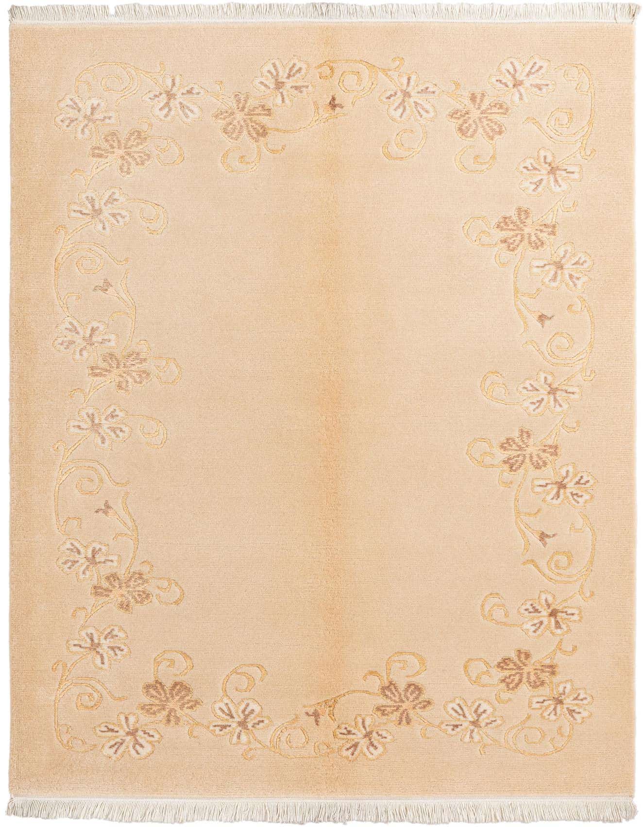 A 4x6 rectangular Darya rug in shades of brown and ivory, featuring an elegant floral border pattern on a tan background, ideal for a living room.