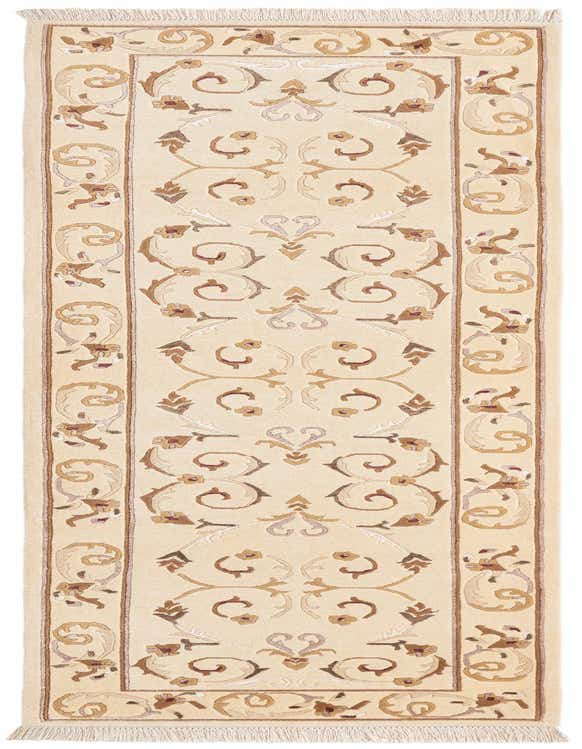 A 10 ft Darya runner rug in ivory and brown with a modern Persian scroll pattern, perfect for a hallway.