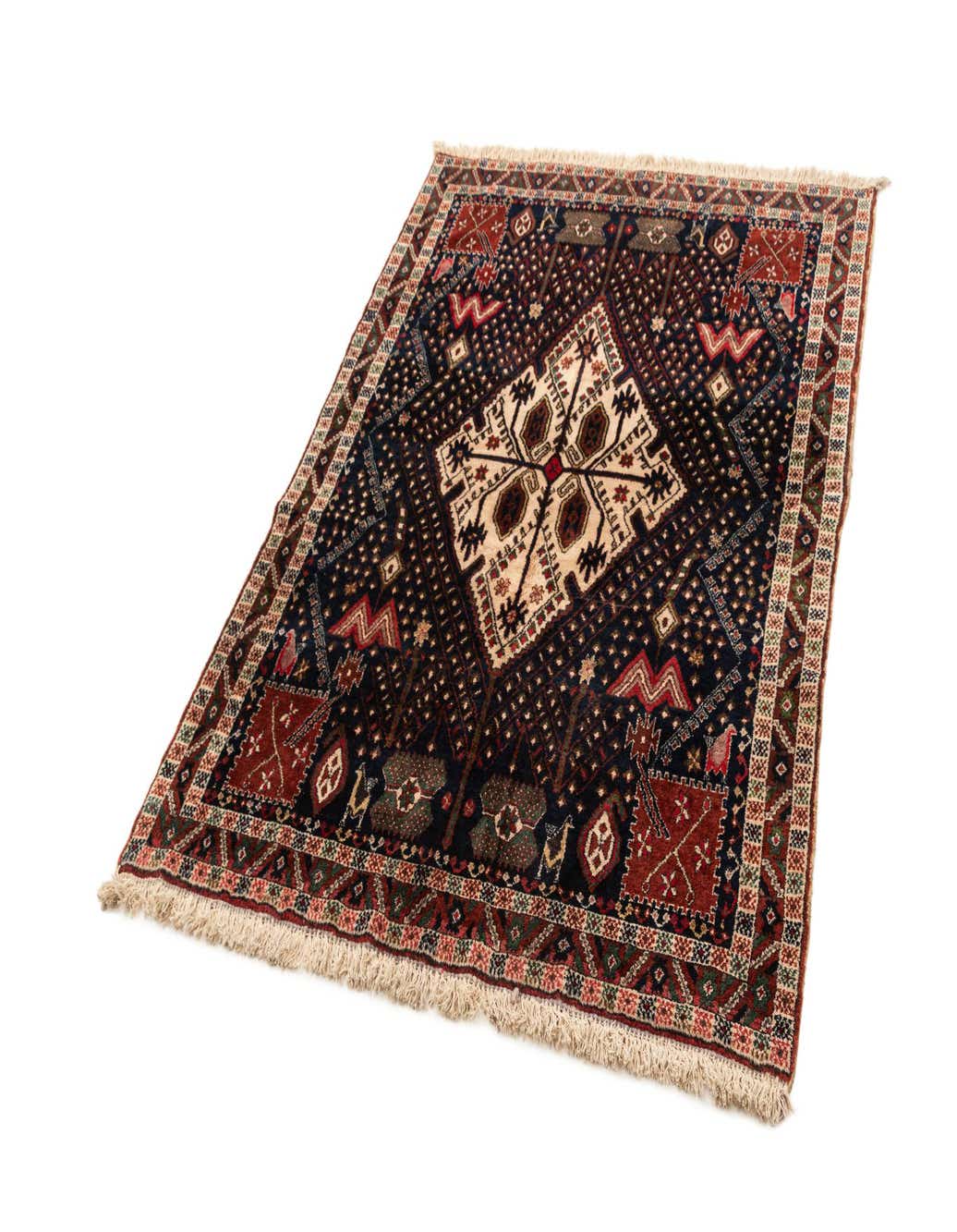A 4x6 rectangular Afshar rug with a dark blue background, featuring a cream diamond medallion and intricate traditional patterns in red, brown, and blue, with fringed edges.