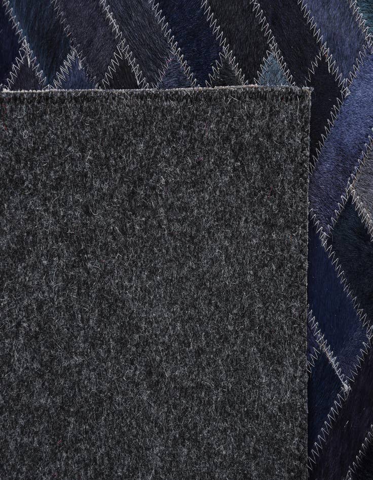 Detail image of  5' 1 x 8' 1 Cowhide Rug