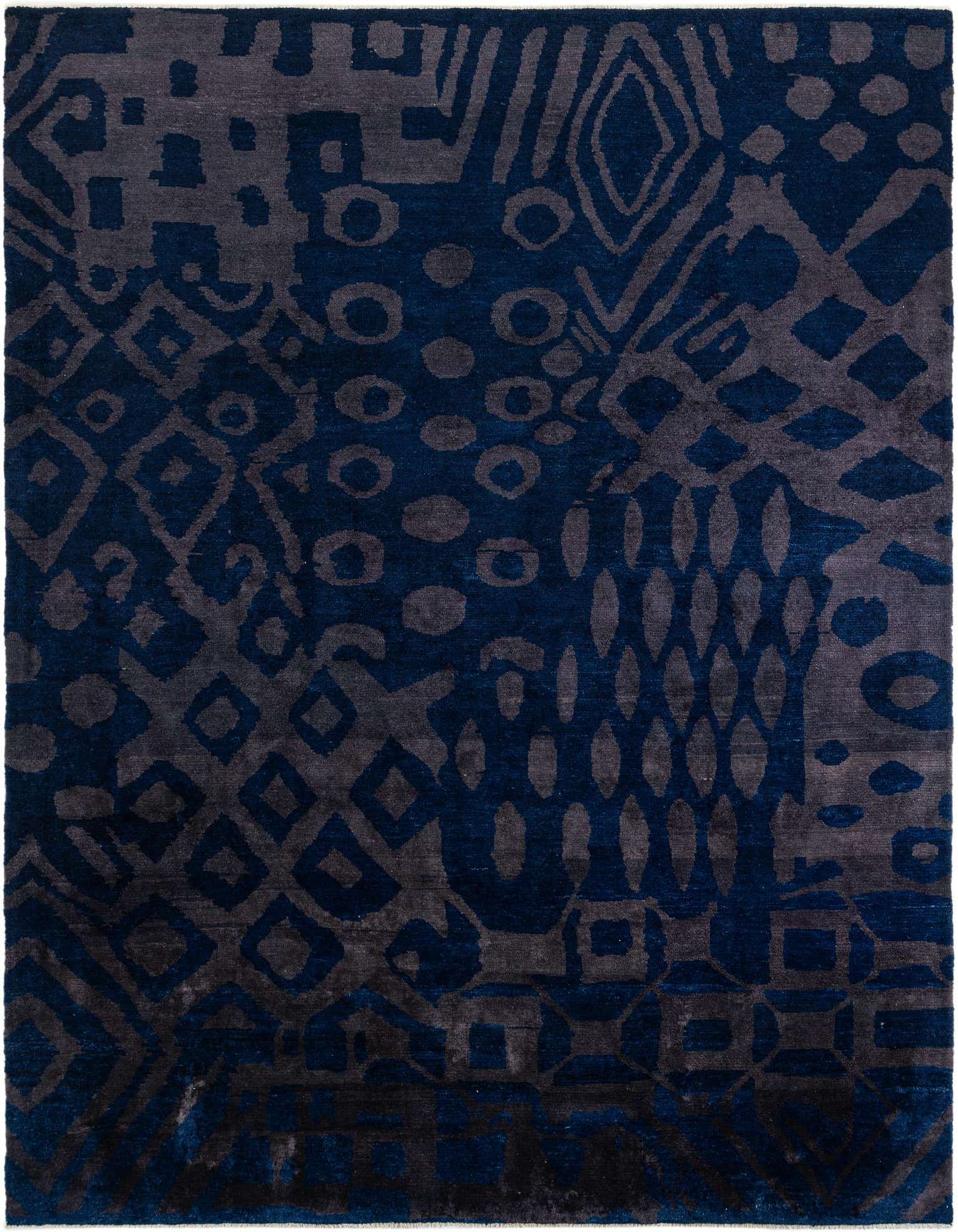 A 9x12 rectangular Darya rug with a modern abstract pattern in varying shades of deep blue and charcoal gray.