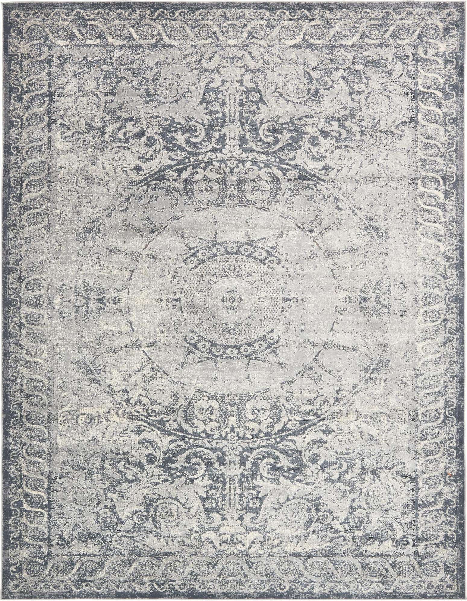 An 8x10 rectangular blue traditional area rug with a vintage medallion and botanical pattern, featuring a textured pile.