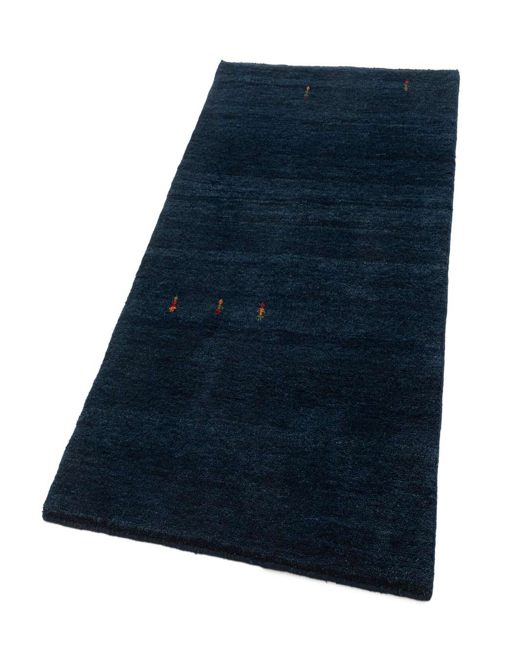 A 4x6 rectangular Gabbeh Shouli rug in deep blue sheep virgin wool with a medium pile, featuring subtle, small, colorful accents.