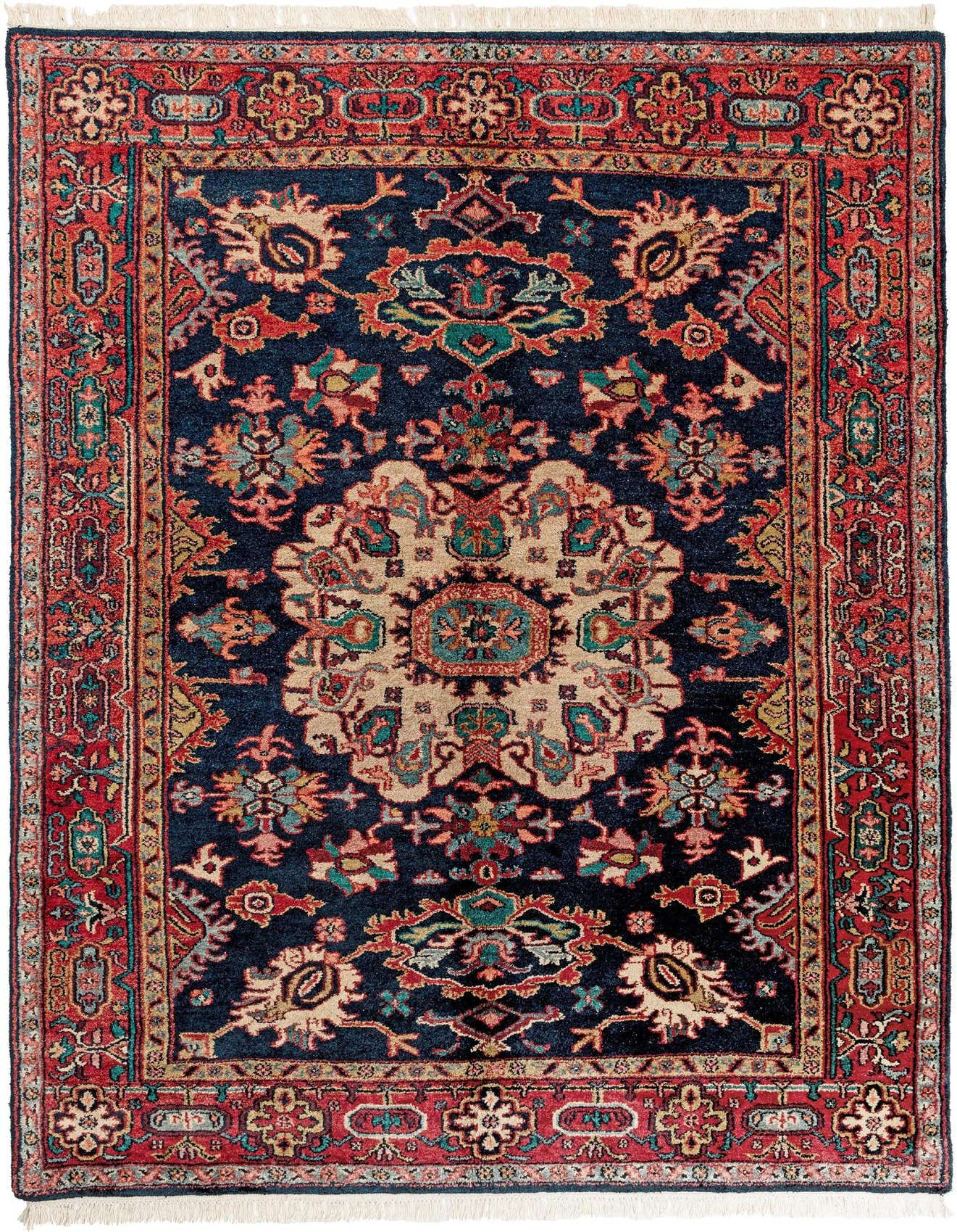 A 5x8 rectangular Heriz rug featuring a complex traditional pattern in deep blues, reds, and creams with fringe.