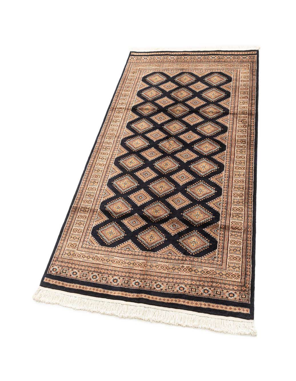 A 4x6 rectangular blue and beige wool and silk area rug with a traditional geometric diamond pattern and fringe.