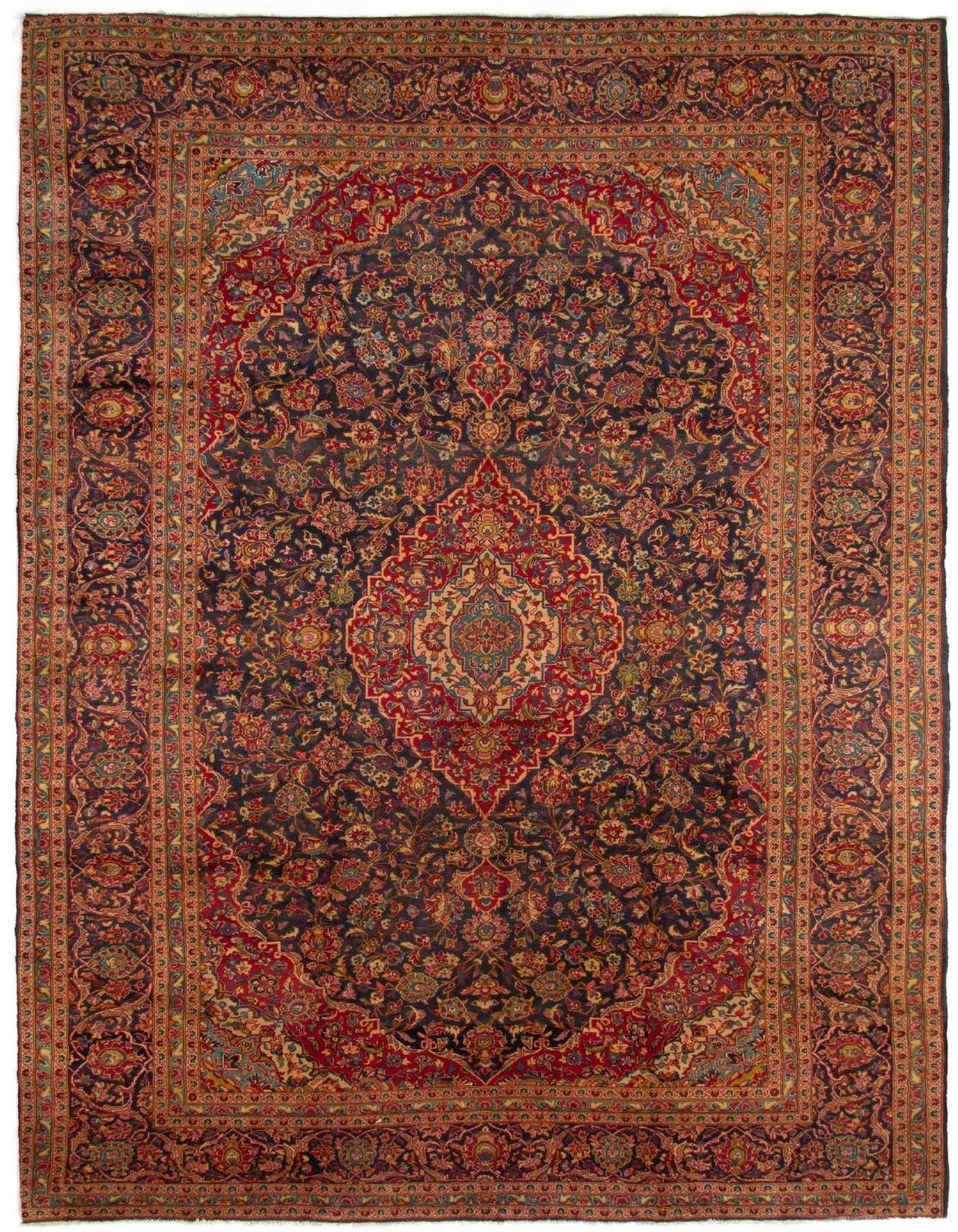 A large 10x16 rectangular Persian wool rug featuring a central medallion and intricate floral patterns in deep blues and reds.