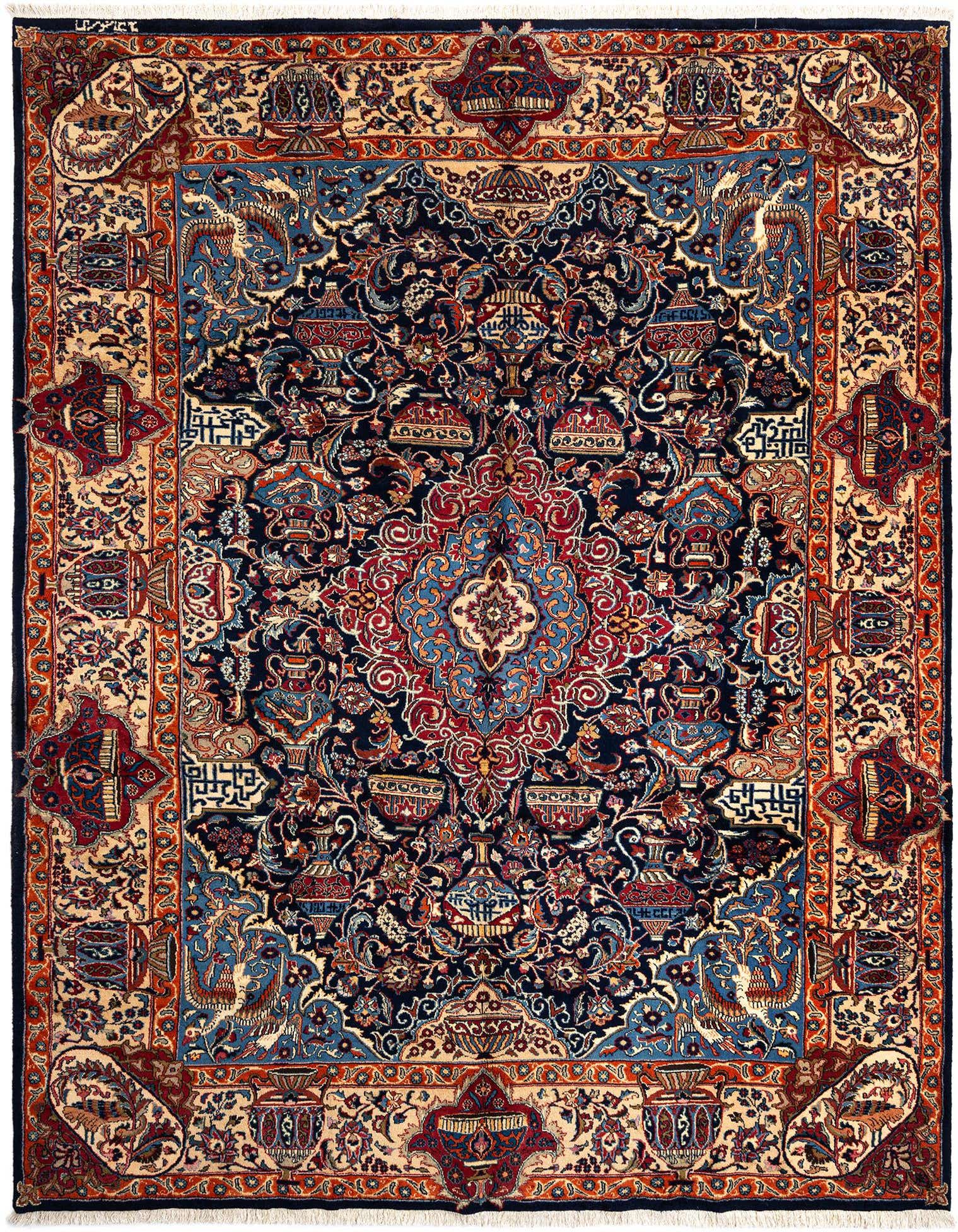 A large 10x13 rectangular Persian rug with intricate blue, red, and beige floral and medallion patterns, handmade from wool.