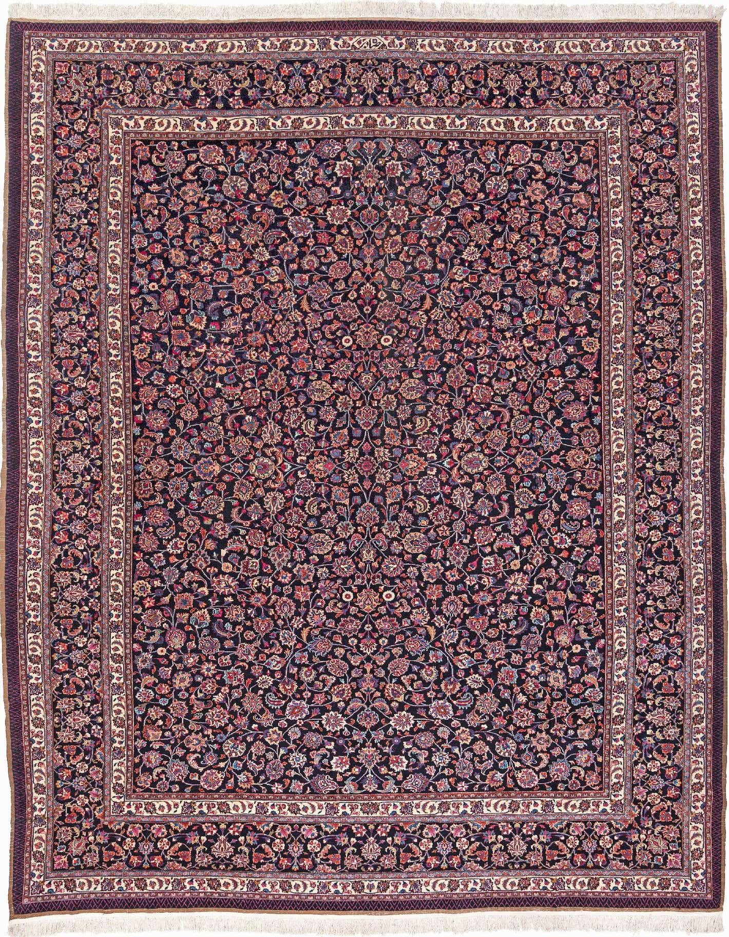 A large 10x13 rectangular Meshed Saber rug with a dark blue field and intricate floral patterns in red, pink, and cream, featuring a multi-layered border.