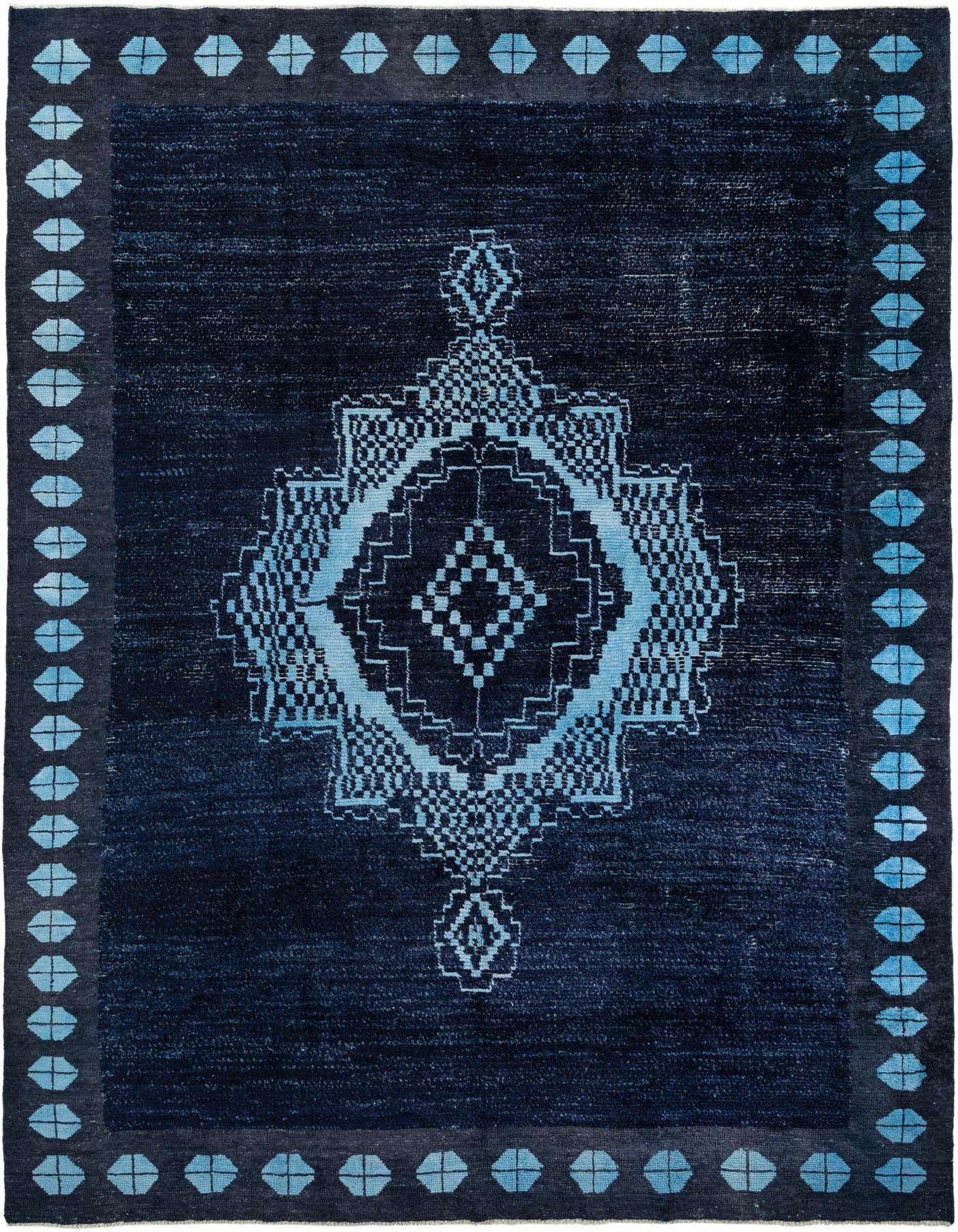 A 10x14 rectangular blue Moroccan shag rug with a light blue tribal geometric medallion pattern and border.