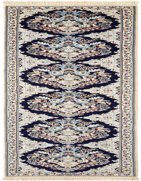 A handmade rectangular Persian runner rug featuring an intricate floral pattern in shades of blue, cream, and hints of red on a dark blue background, with cream fringe.