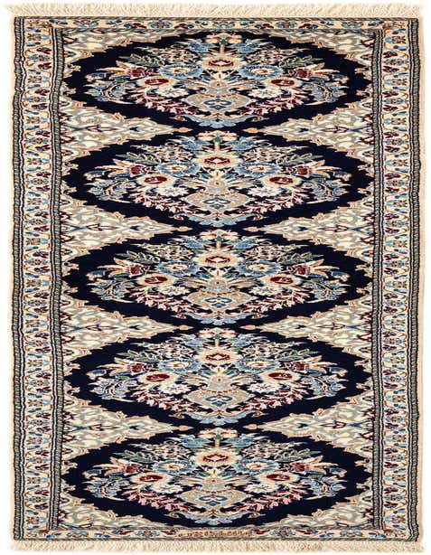 A handmade rectangular Nain Persian runner rug featuring a deep blue field with intricate floral motifs in blues, creams, and hints of red, bordered by a cream frame.