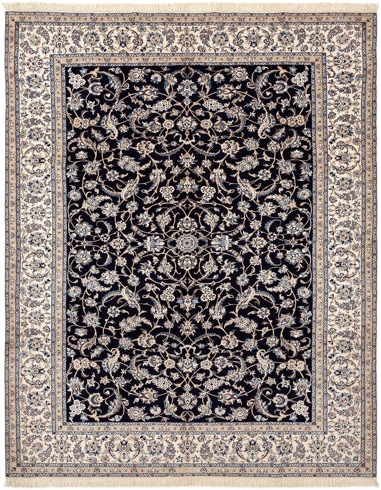 A rectangular handmade Persian rug with a dark blue field and intricate floral patterns in cream, light blue, and gold, framed by a wide cream border.