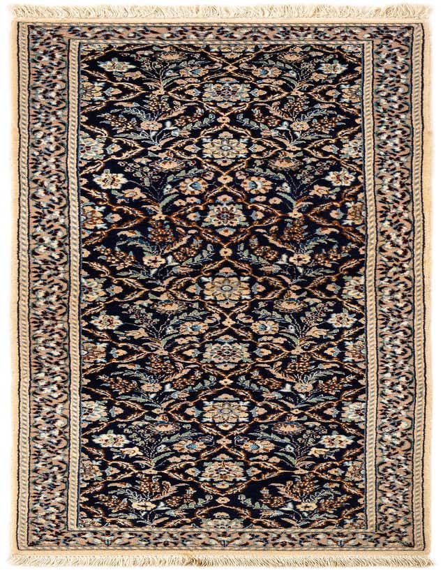 A rectangular handmade Persian runner rug with a navy blue field and intricate floral patterns in cream, light blue, and brown, framed by a detailed border.