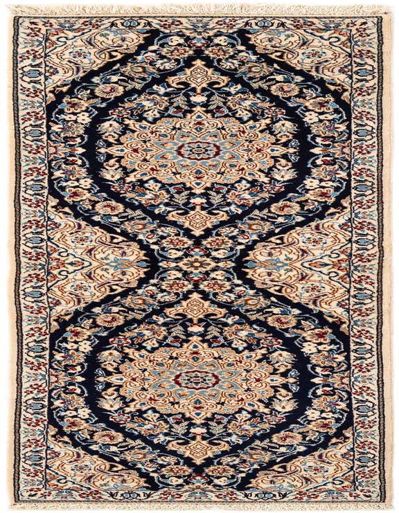 A rectangular handmade Persian rug featuring a deep blue field with intricate cream, light blue, and red floral motifs and a matching border.
