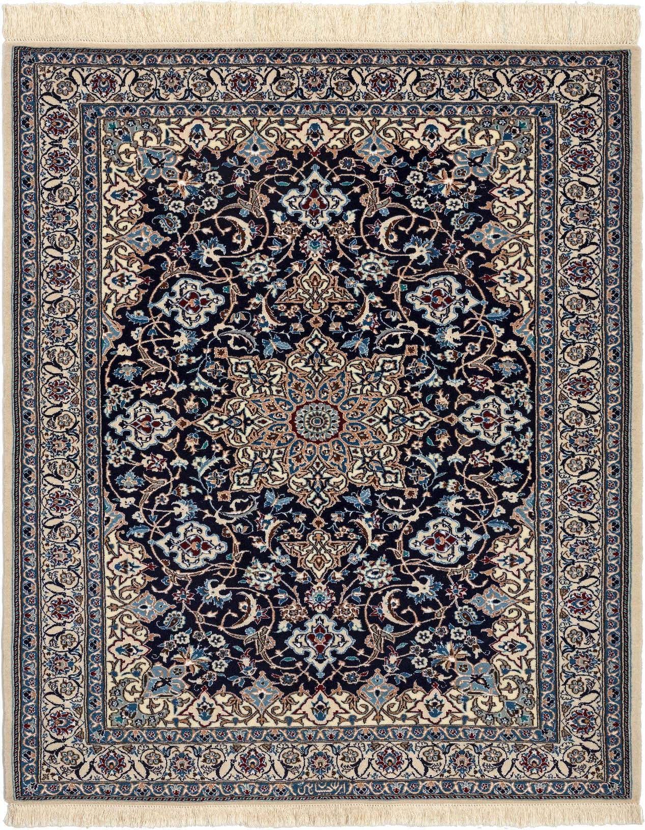 A 4x6 rectangular handmade wool and silk rug featuring a rich navy blue field with intricate traditional patterns in light blue, cream, and hints of red, framed by a detailed border and cream fringe.