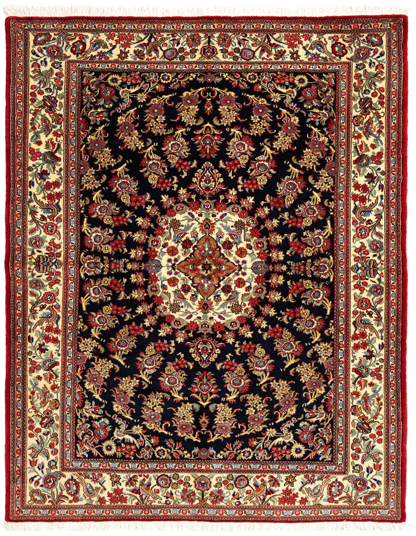 A 4x6 rectangular handmade Persian rug with a dark blue field, intricate floral patterns, and a cream border with red accents.