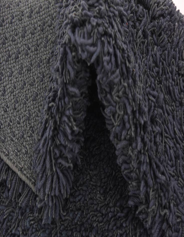 Detail image of  5' 6 x 7' 6 Solid Shag Rug