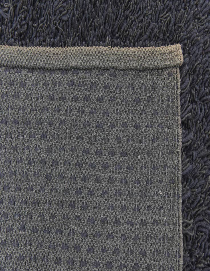 Detail image of  5' 6 x 7' 6 Solid Shag Rug