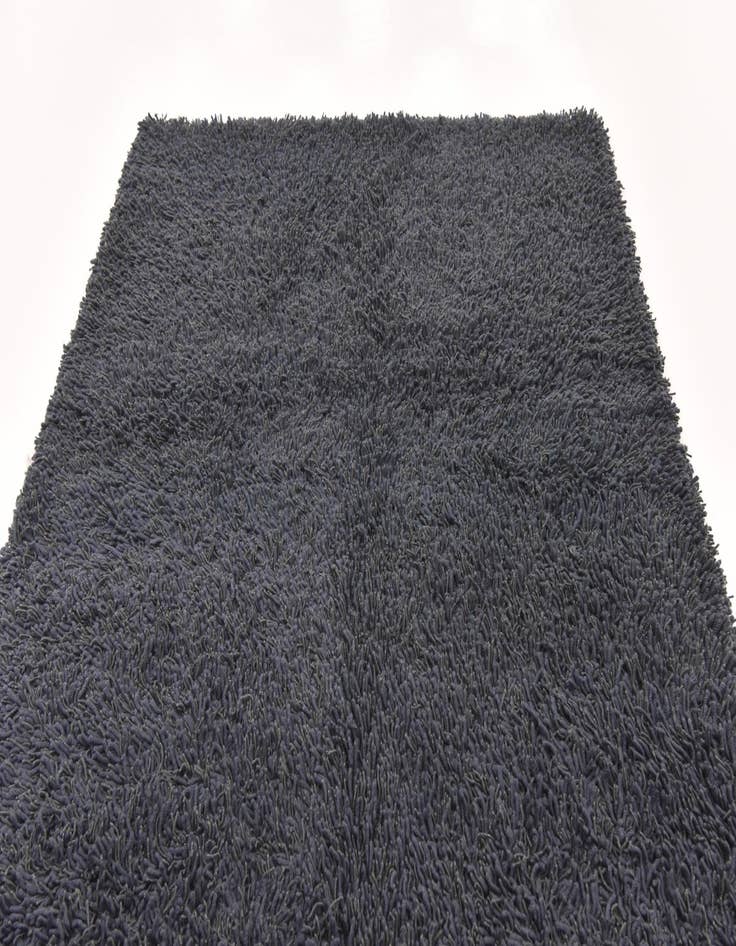 Detail image of  5' 6 x 7' 6 Solid Shag Rug