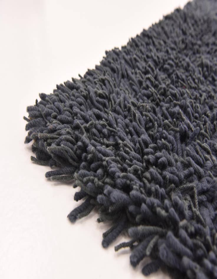 Detail image of  5' 6 x 7' 6 Solid Shag Rug