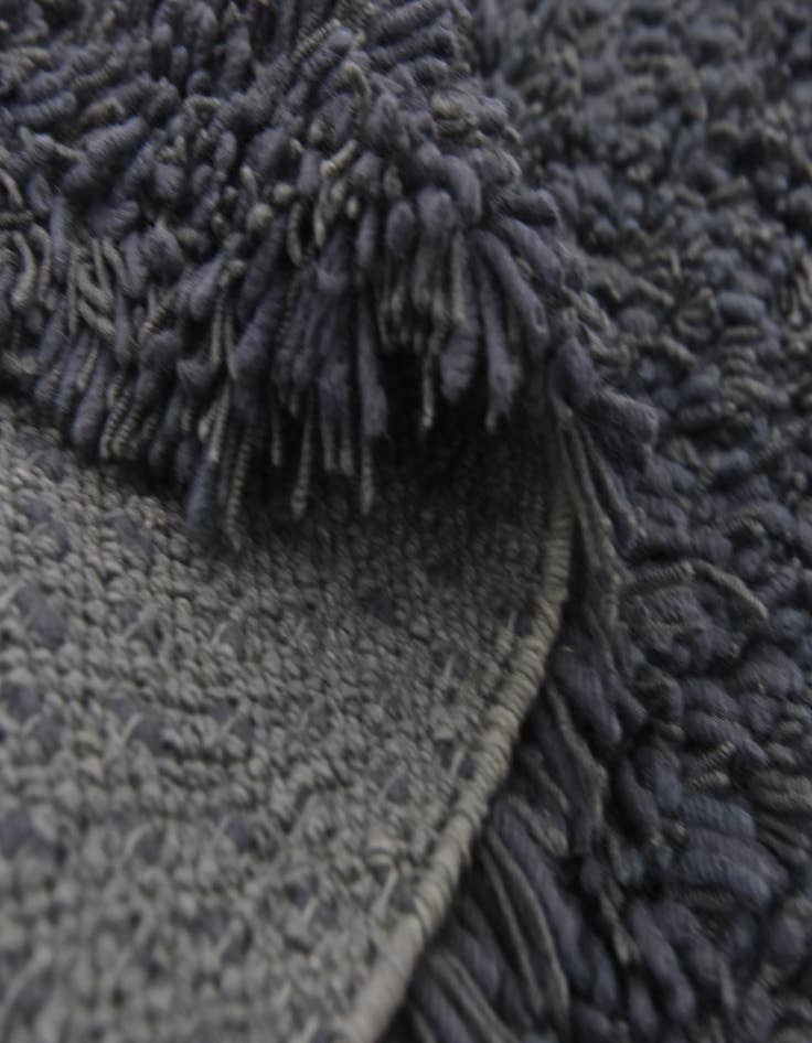 Detail image of  5' 6 x 7' 6 Solid Shag Rug