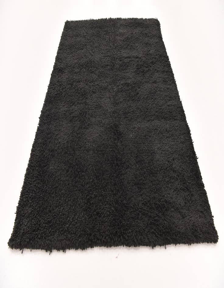 Detail image of  5' 7 x 7' 7 Solid Shag Rug