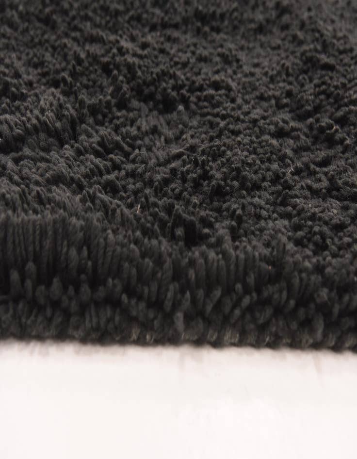 Detail image of  5' 7 x 7' 7 Solid Shag Rug