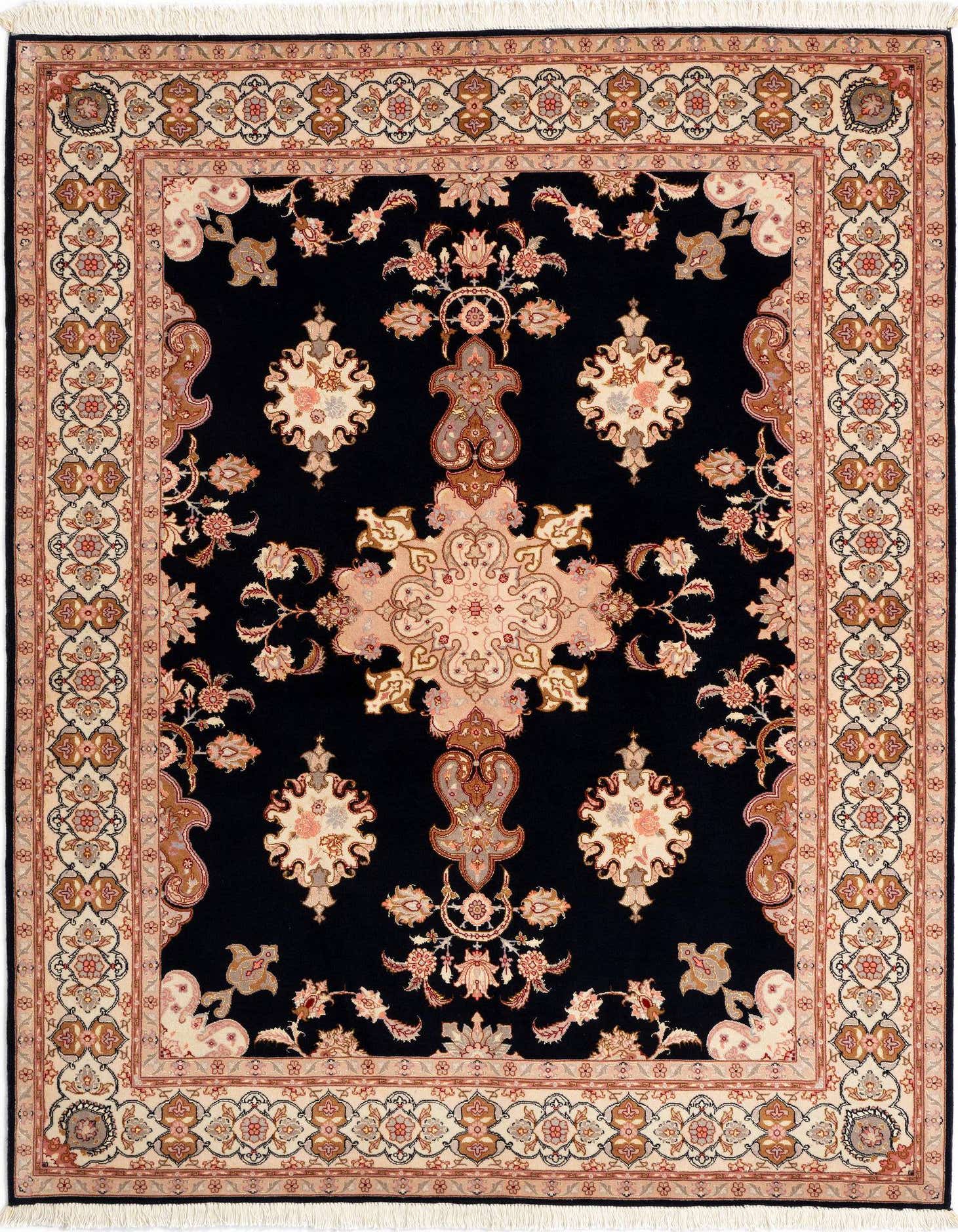 A 4x6 rectangular Persian rug with a deep blue field and intricate floral motifs in cream, pink, and brown, featuring a central medallion.