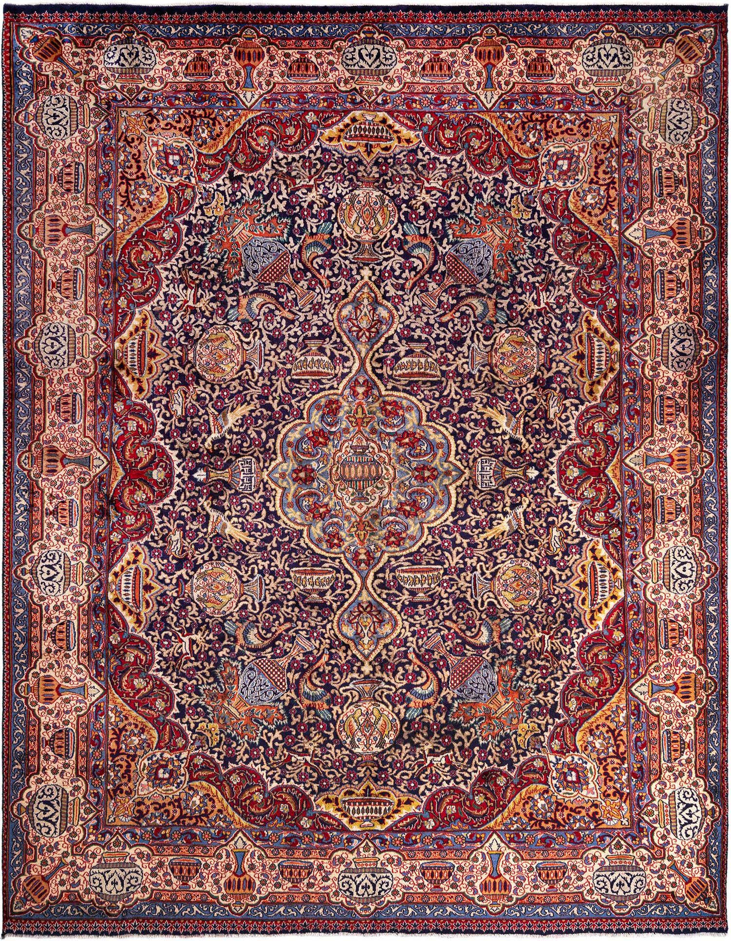 A 9x12 rectangular Persian wool rug featuring a complex blue and red floral medallion pattern with intricate borders.