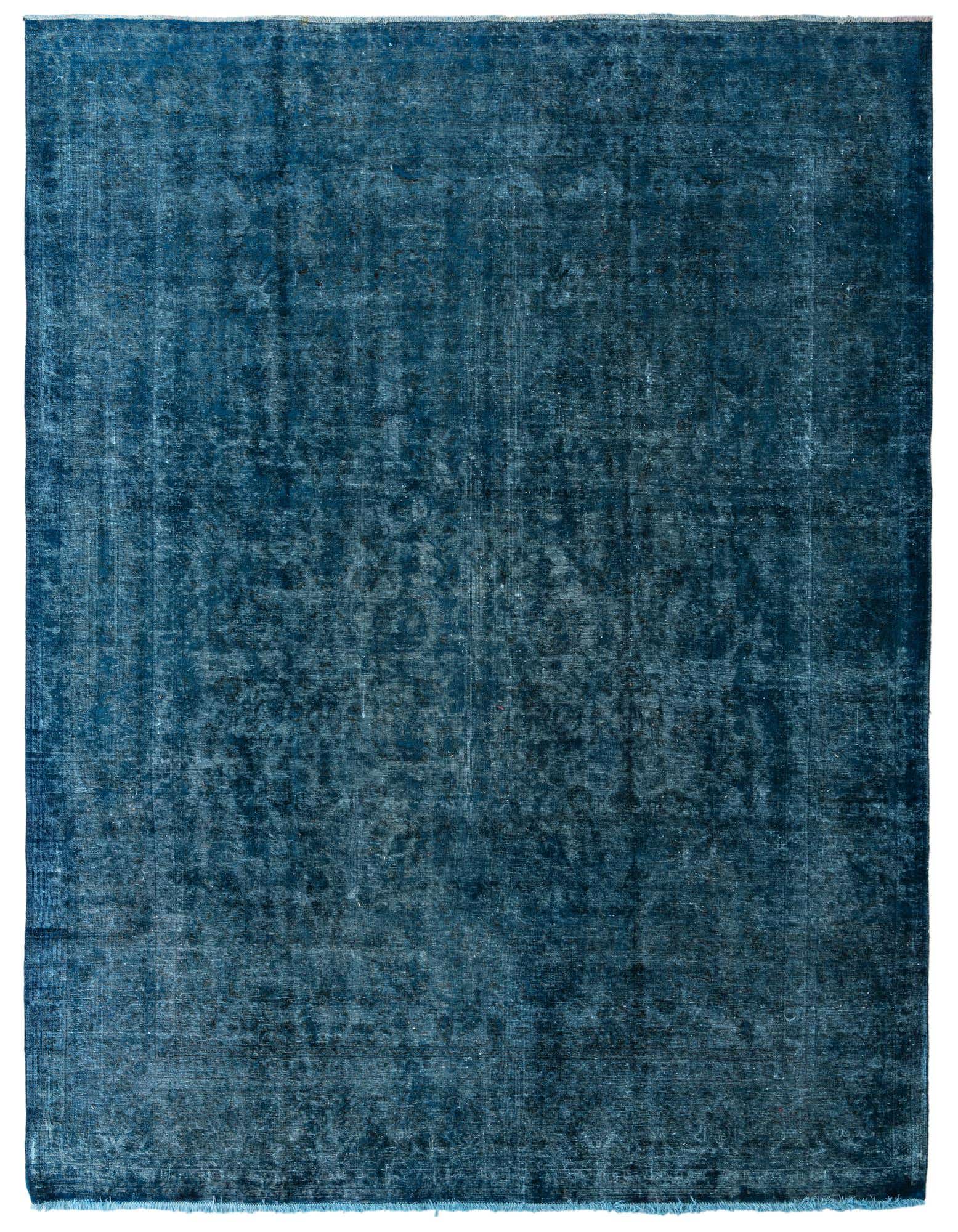 A large 10x13 rectangular Ultra Vintage wool rug in varying shades of deep blue, featuring a subtle, distressed Persian-style pattern.