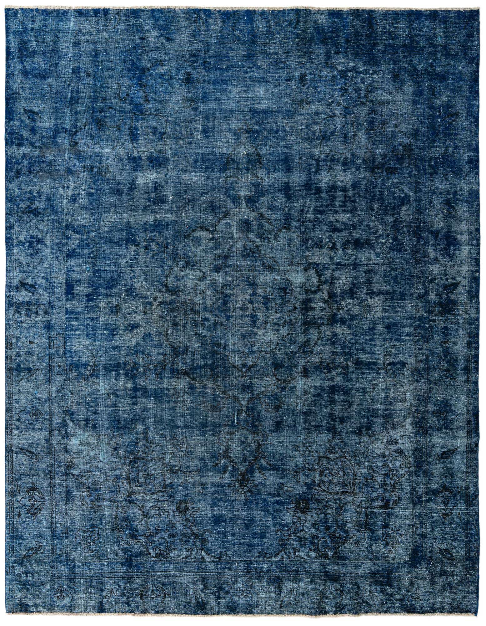 A 9x12 rectangular blue Persian-style wool rug with a faded vintage medallion pattern, suitable for a living room.